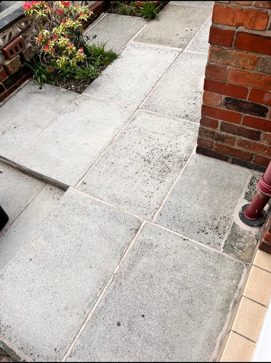 Renewed jointing between the stone flags in Eccleston, filled level and weed free