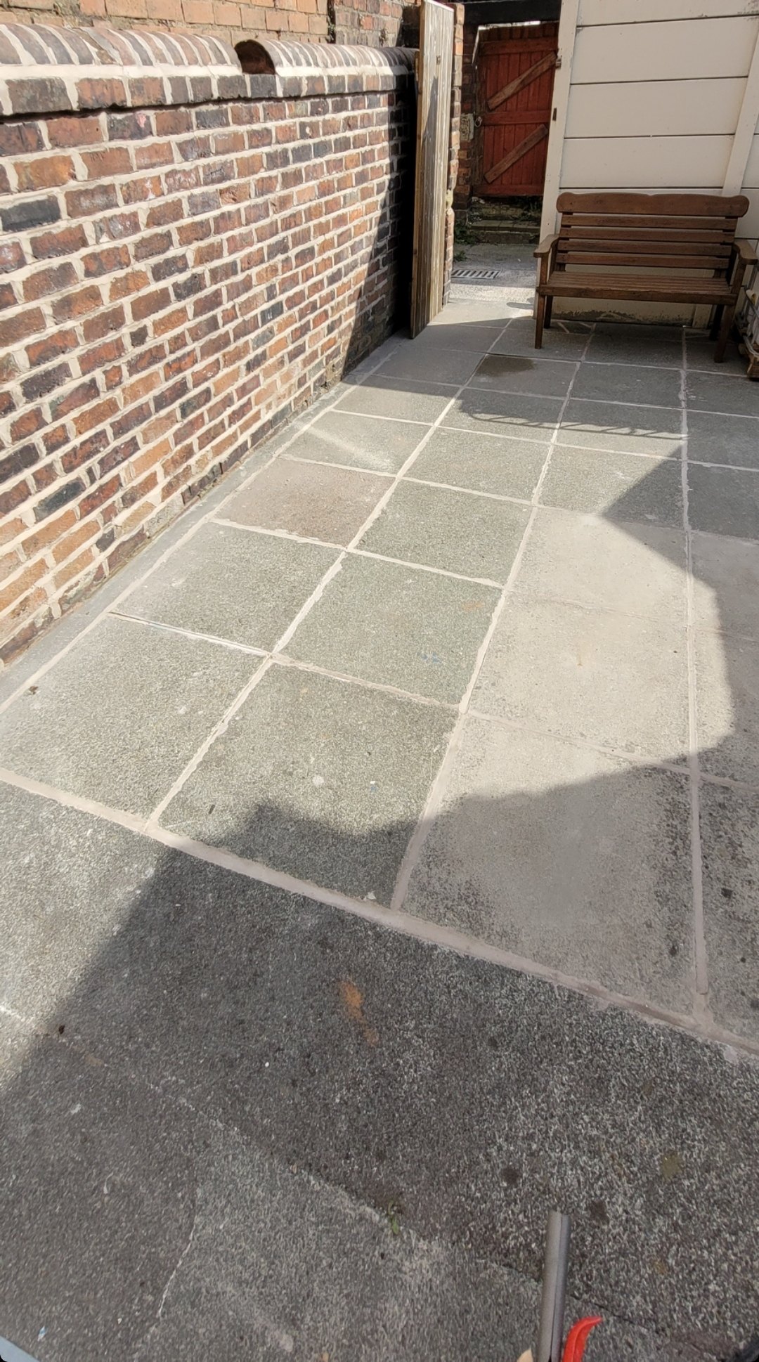 Close view of the finished pointing between the patio flags in Eccleston, mortar packed level and clean