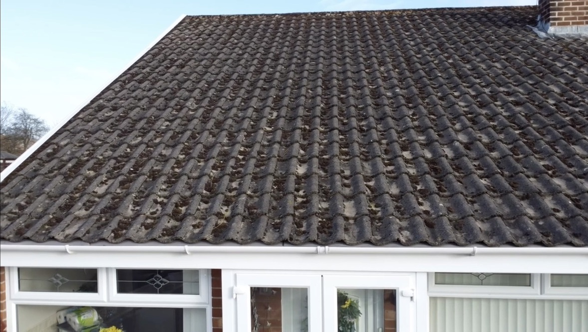 Moss-covered roof on a bungalow in Ainsdale before cleaning